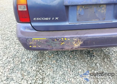 1997 Ford Escort Lx z USA, uszkodzony, nr VIN 3FALP15P1VR145288